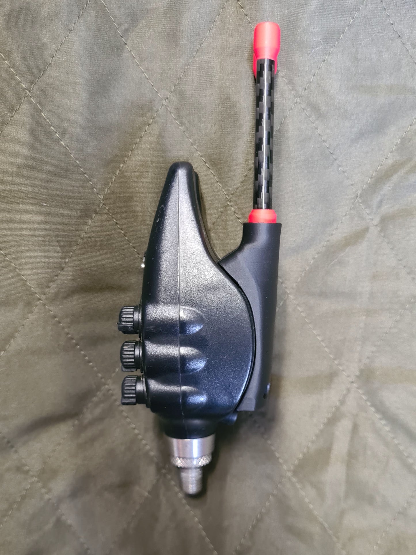 Fox NTXr bite alarm with carbon snag ears red side view