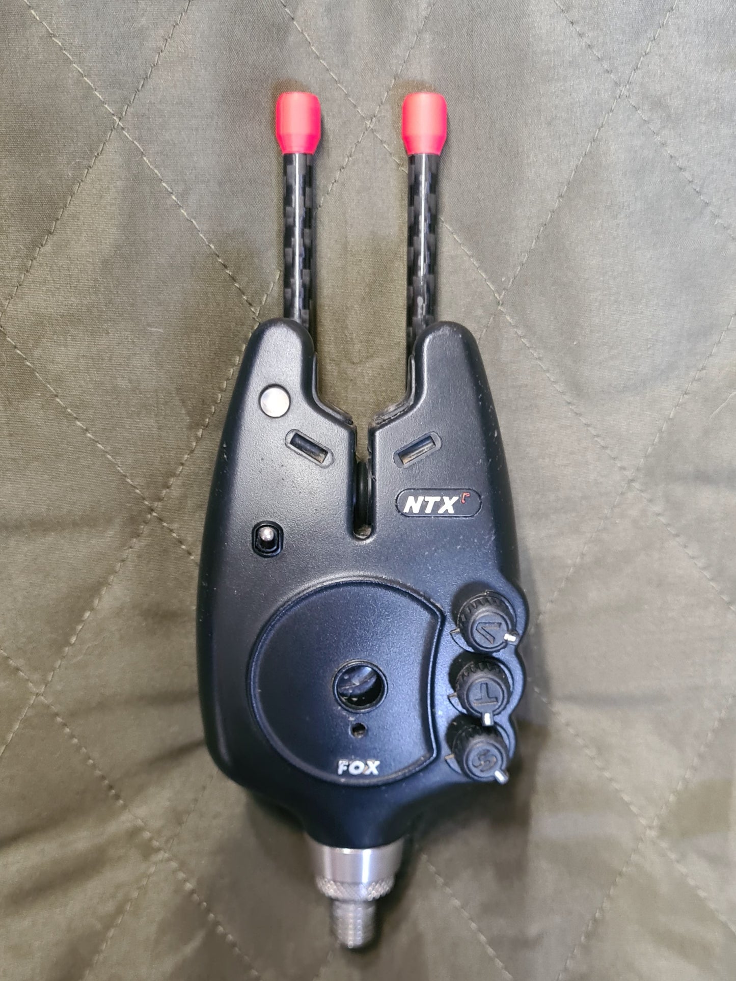 Fox NTXr bite alarm with carbon snag ears red front view
