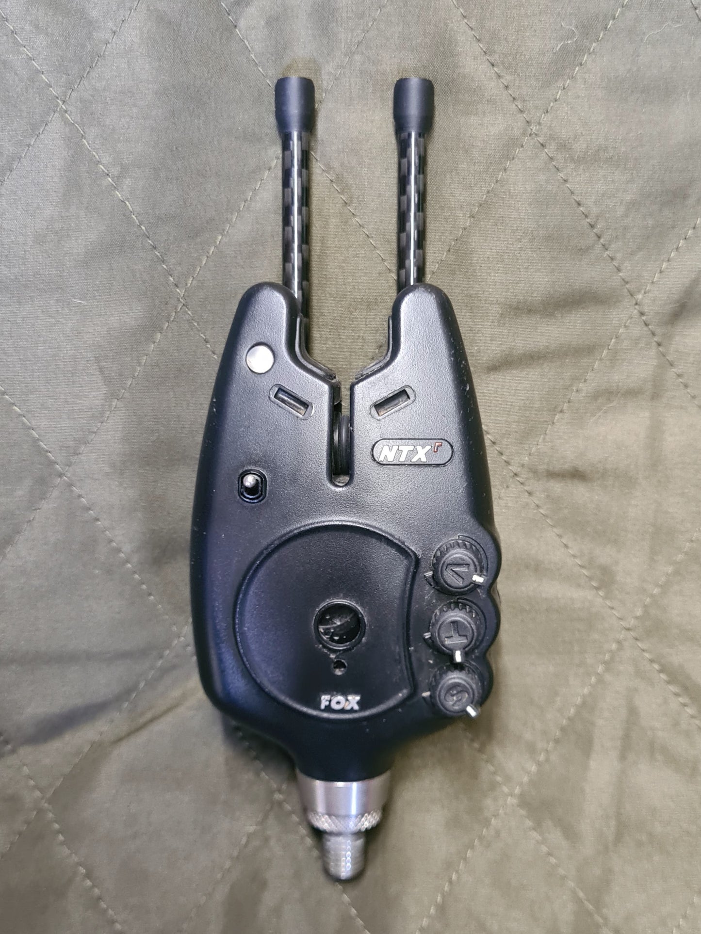 Fox NTXr bite alarm with black carbon snag ears