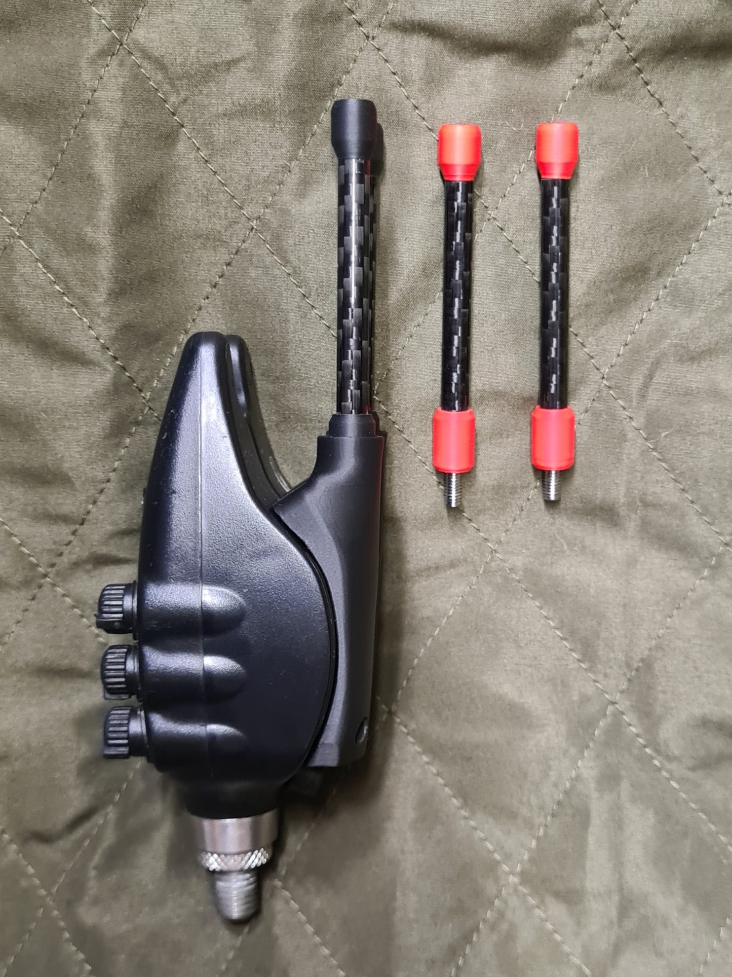 Fox NTXr bite alarm with carbon snag ears with red or black ears