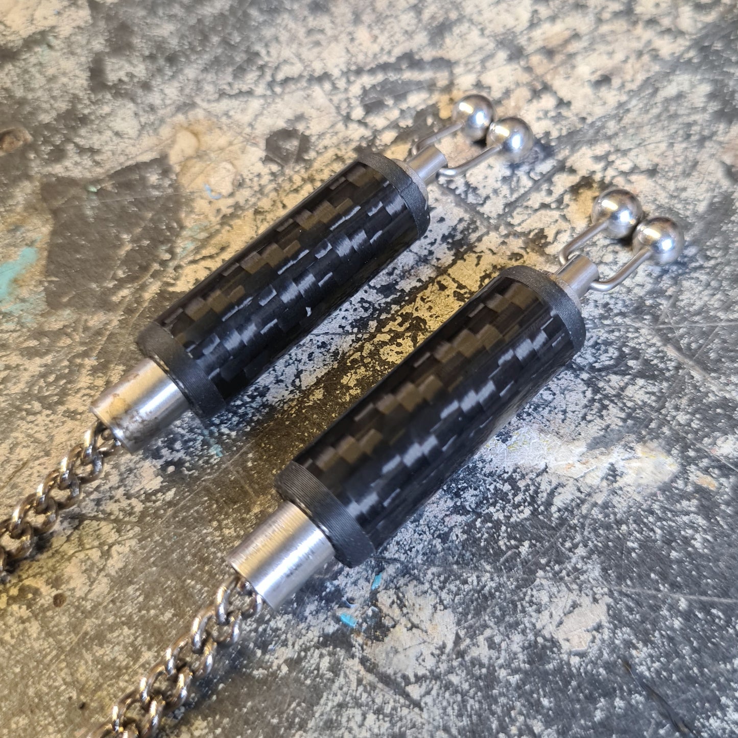 Woven carbon fibre bobbins for carp fishing